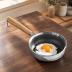 Deep Stainless Steel Mini Frying Pan cooking an egg