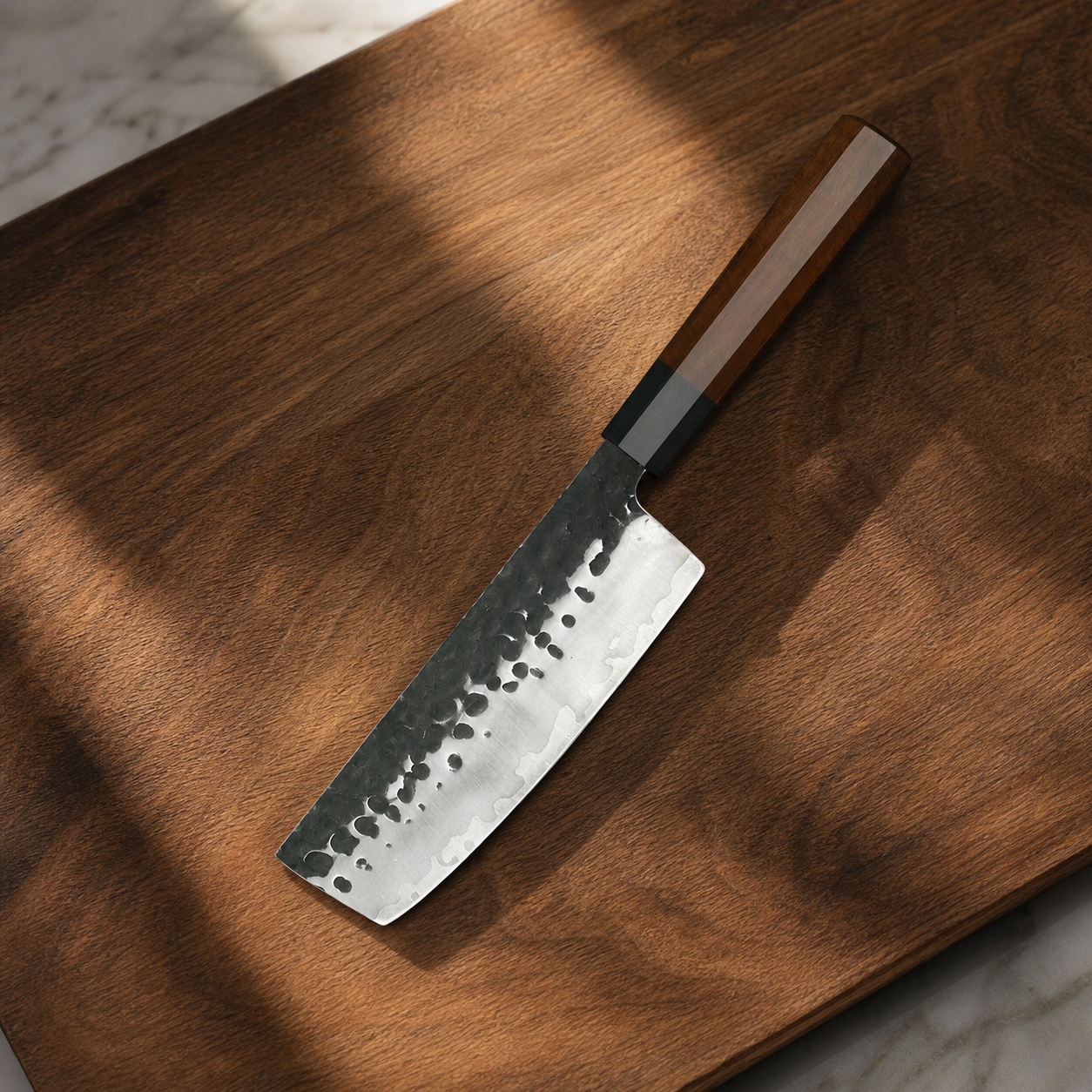 Forged kitchen knife on a walnut cutting board