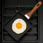 Egg cooking in the compact square non-stick pan