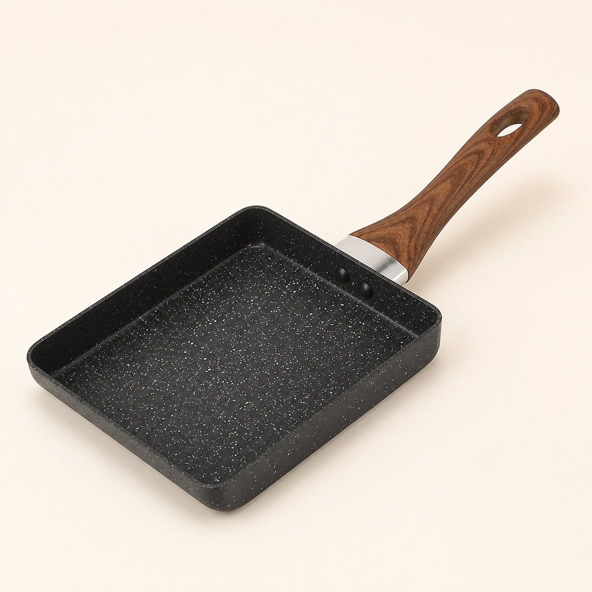Compact square non-stick egg pan, three-quarter view