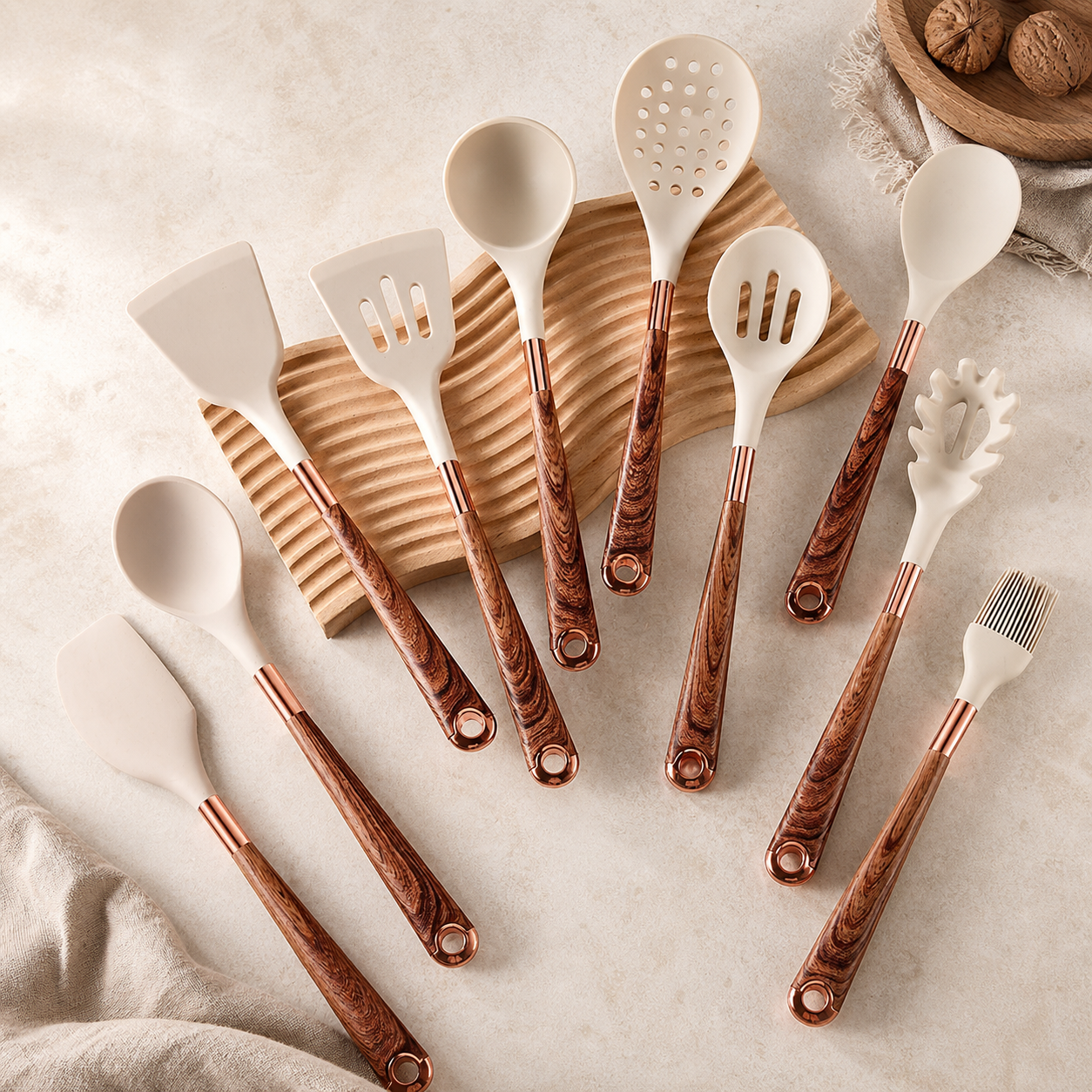 Ten-piece silicone utensil set with wooden handles arranged overhead