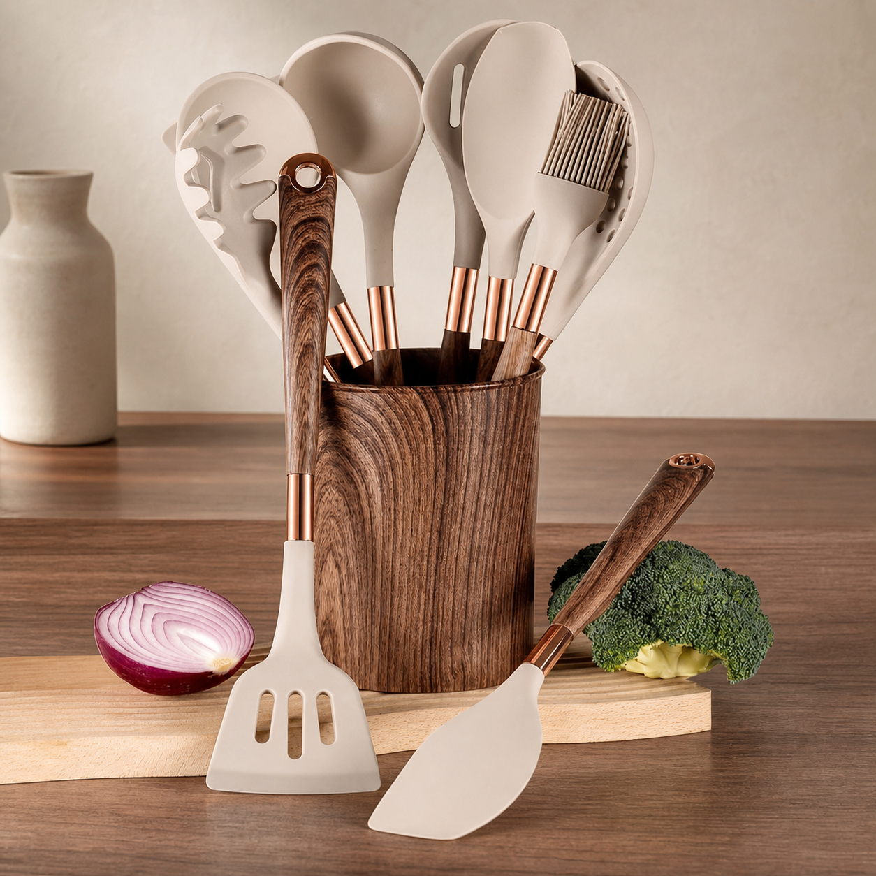 Ten-piece silicone utensil set with wooden handles in its storage holder
